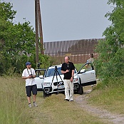 Matti, Leif and Roger in front of the border fence at Sable Park, Brownsville
